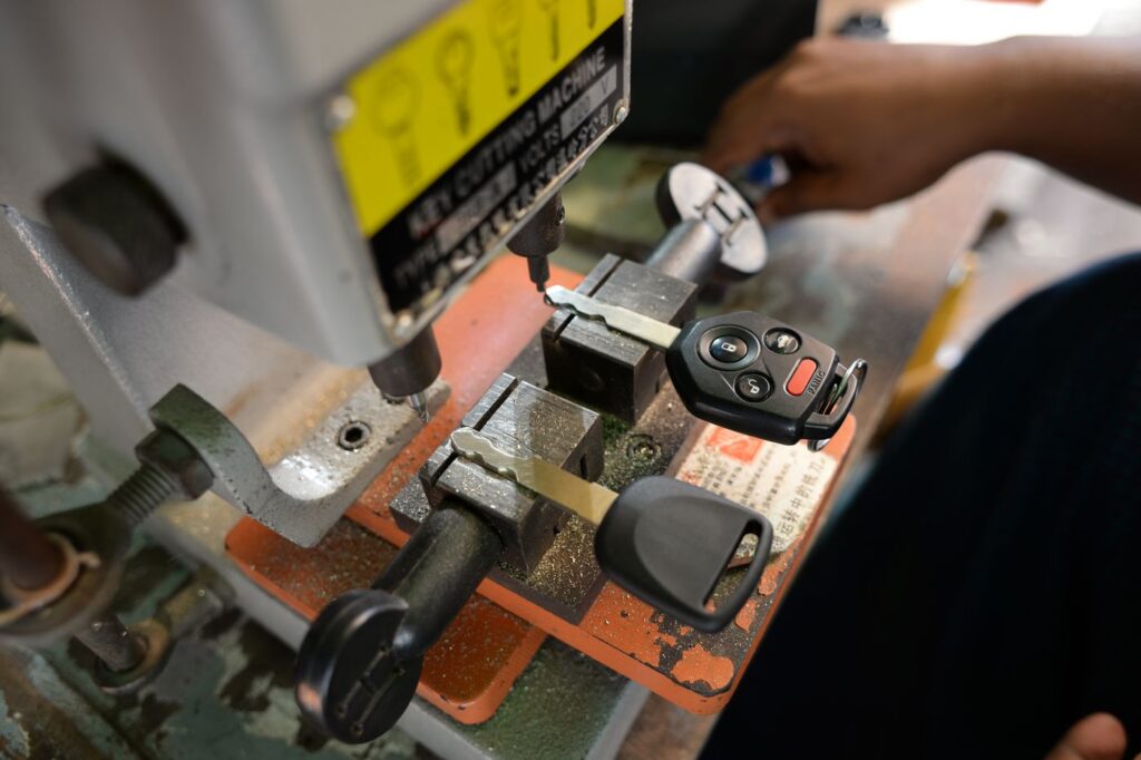 Car key being cut on a key machine